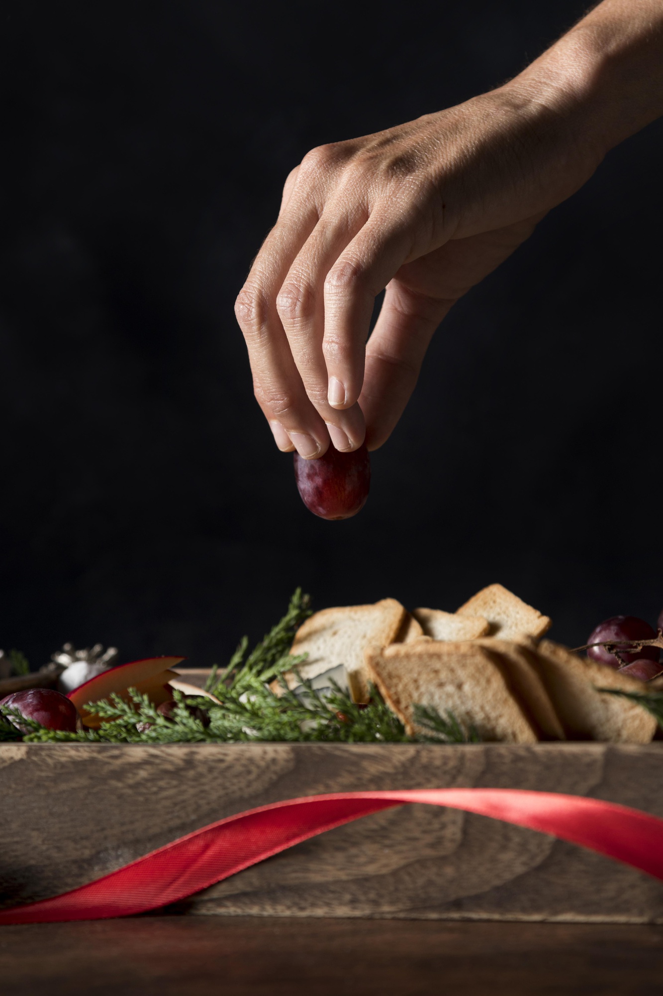 Chef hands finishing garnish